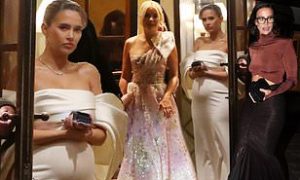 Pregnant Molly-Mae Hague checks her phone after calling it a night as she joins Holly Willoughby and Ferne McCann heading home following the star-studded Pride Of Britain Awards